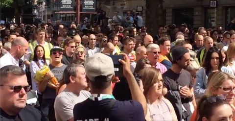 Manchester mourners sing Oasis 'Don't Look Back In Anger' at minute's silence after terror attack