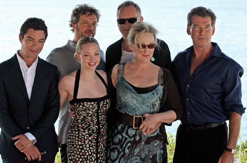 Dominic Cooper, British actor Colin Firth, US actress Amanda Seyfried, Swedish actor Stellan Skarsgard, US actress Meryl Streep and Irish actor Pierce Brosnan pose during a photo opportunity for the promotion of the new movie 'Mamma Mia'