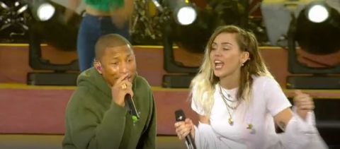 Pharrell Williams and Miley Cyrus at One Love Manchester