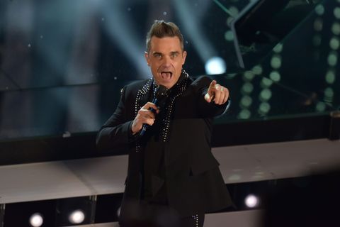 Is Robbie Williams' new tattoo of his face real or not?