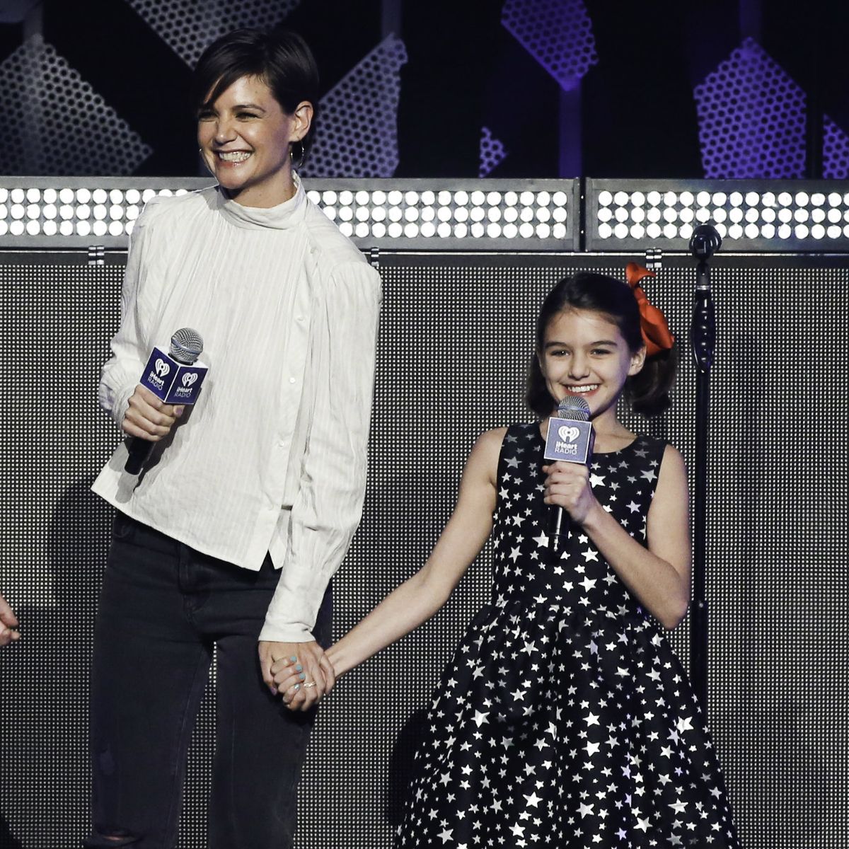 Katie Holmes and daughter Suri Cruise introduce Taylor Swift on stage at  iHeartRadio Jingle Ball