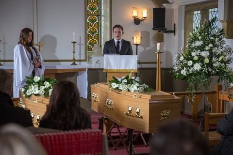 Lachlan White speaks at the funeral in Emmerdale