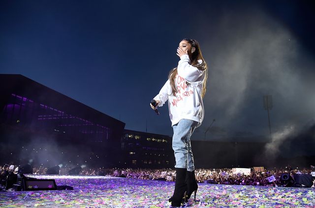 Ariana Grande wipes away a tear as she performs on stage during the One Love Manchester Benefit Concert at Old Trafford Cricket Ground on June 4, 2017 in Manchester, England