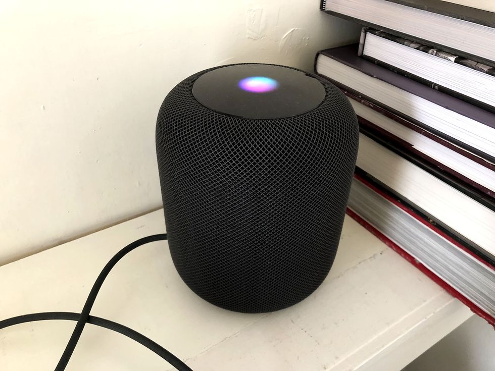 Apple HomePod smart speaker with Siri in action