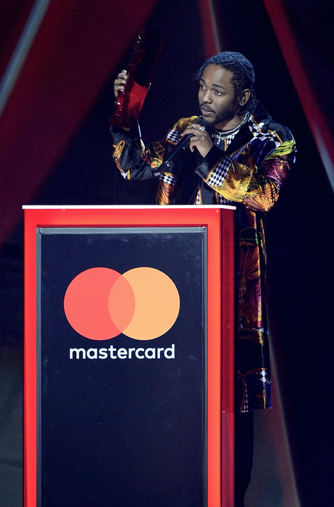 Kendrick Lamar speaks on stage at The BRIT Awards 2018 held at The O2 Arena on February 21, 2018 in London, England