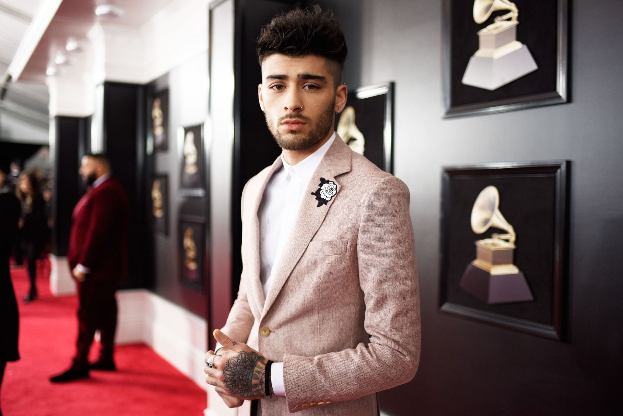 Zayn Malik, white rose detail, attends the 60th Annual GRAMMY Awards