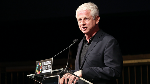 Richard Curtis speaks on stage at the Keepers Global Goals Awards