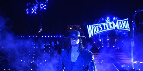The Undertaker enters the ring at WrestleMania 33 to face Roman Reigns