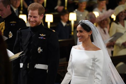 Prince Harry and Meghan Markle stand at the altar during their wedding in St George's Chapel at Windsor Castle