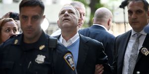 Harvey Weinstein arrives for arraignment at Manhattan Criminal Courthouse in handcuffs after being arrested and processed on charges of rape, committing a criminal sex act, sexual abuse and sexual misconduct on May 25, 2018 in New York City