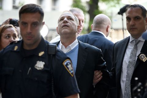 Harvey Weinstein arrives for arraignment at Manhattan Criminal Courthouse in handcuffs after being arrested and processed on charges of rape, committing a criminal sex act, sexual abuse and sexual misconduct on May 25, 2018 in New York City
