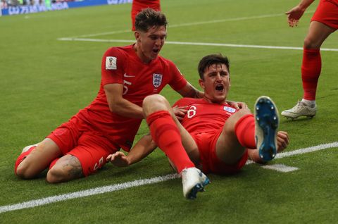 Harry McGuire celebrates scoring during Sweden v England World Cup Quarter Final game