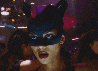 1531407474-catwoman-halle-berry-licks-lips.gif