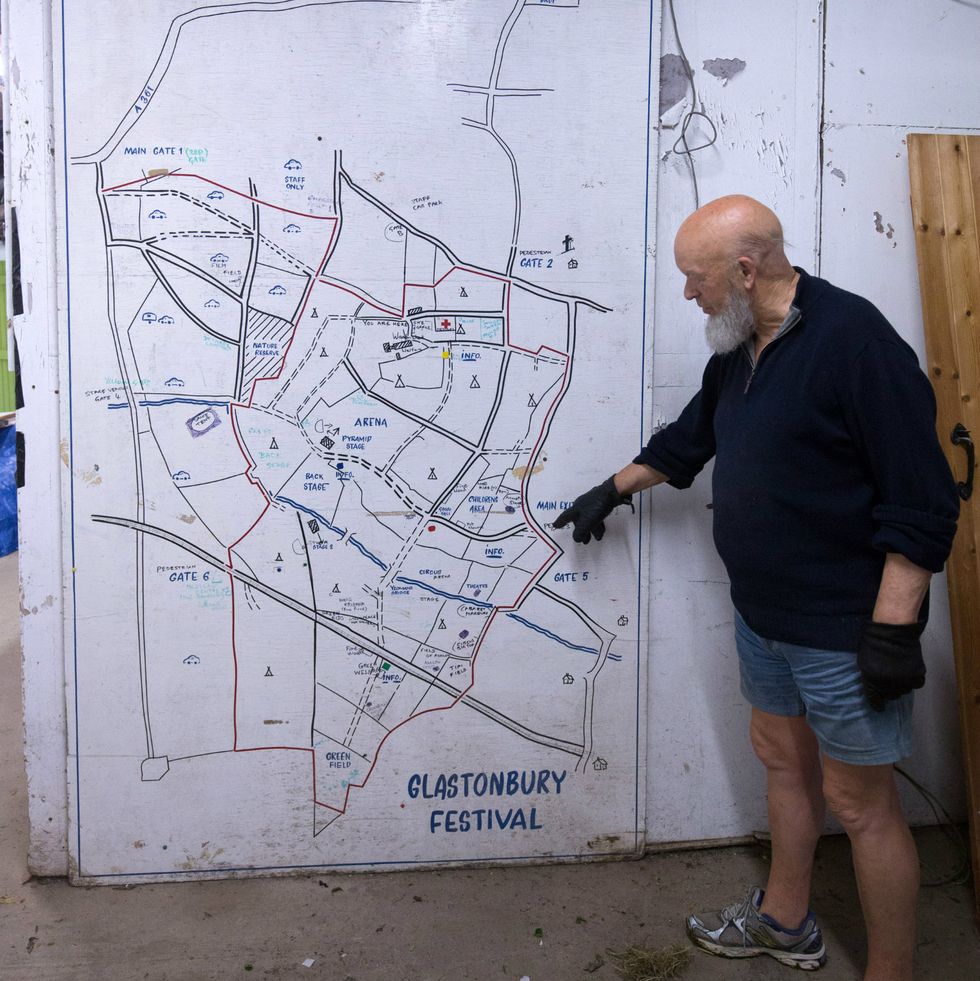 Michael Eavis with a Glastonbury Festival Map