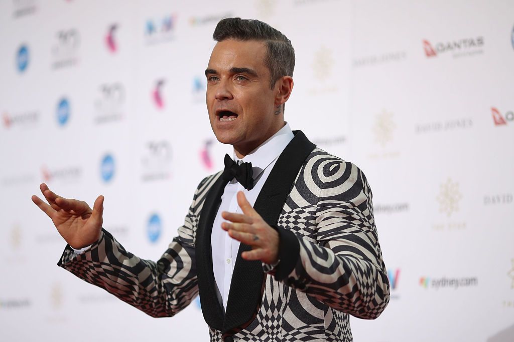 Goot met tijd heilig Robbie Williams has released a Covid-themed Christmas song called Can't  Stop Christmas