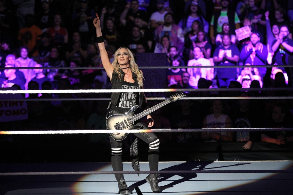 Nita Strauss performing at WWE Evolution