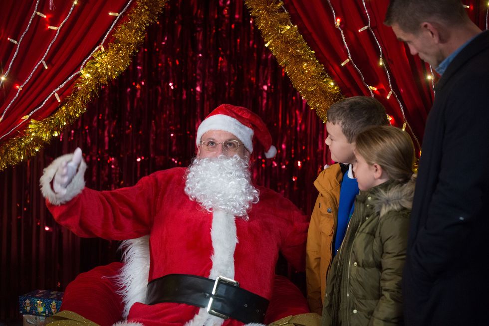 Stuart Highway annoys Jack Branning while dressed as Santa in EastEnders