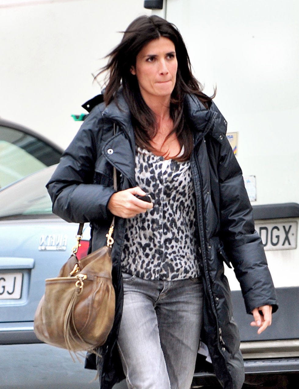 Clothing, Brown, Jacket, Bag, Denim, Textile, Outerwear, Vehicle registration plate, Style, Street fashion, 