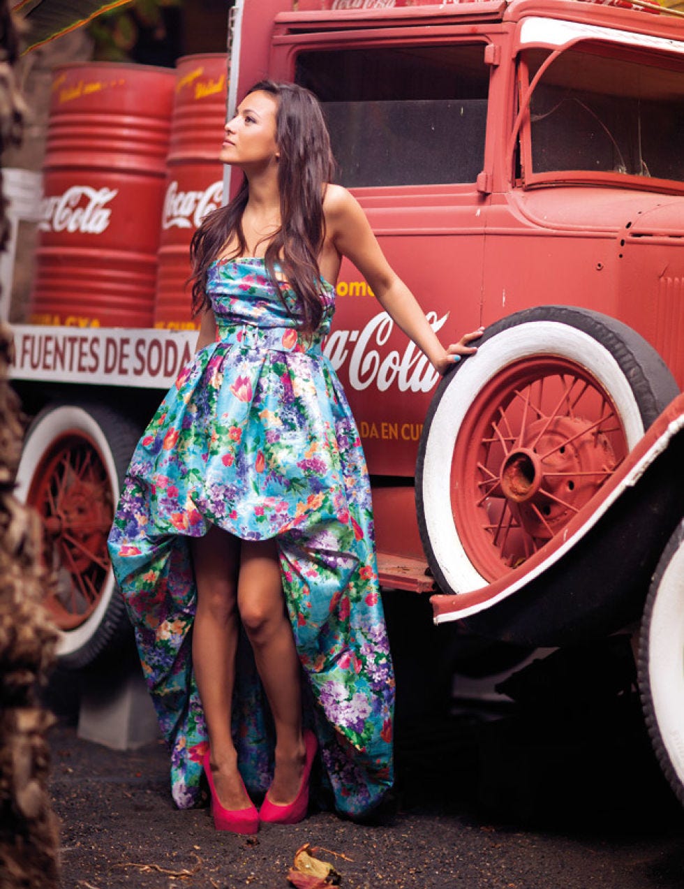 Automotive tire, Human leg, Red, Dress, Fender, Automotive wheel system, Rim, Street fashion, Auto part, One-piece garment, 