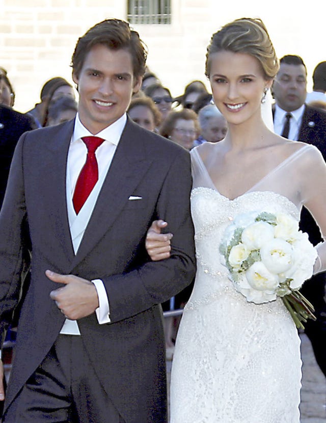 Clothing, Coat, Smile, Trousers, Petal, Shirt, Suit, Photograph, Dress, Outerwear, 
