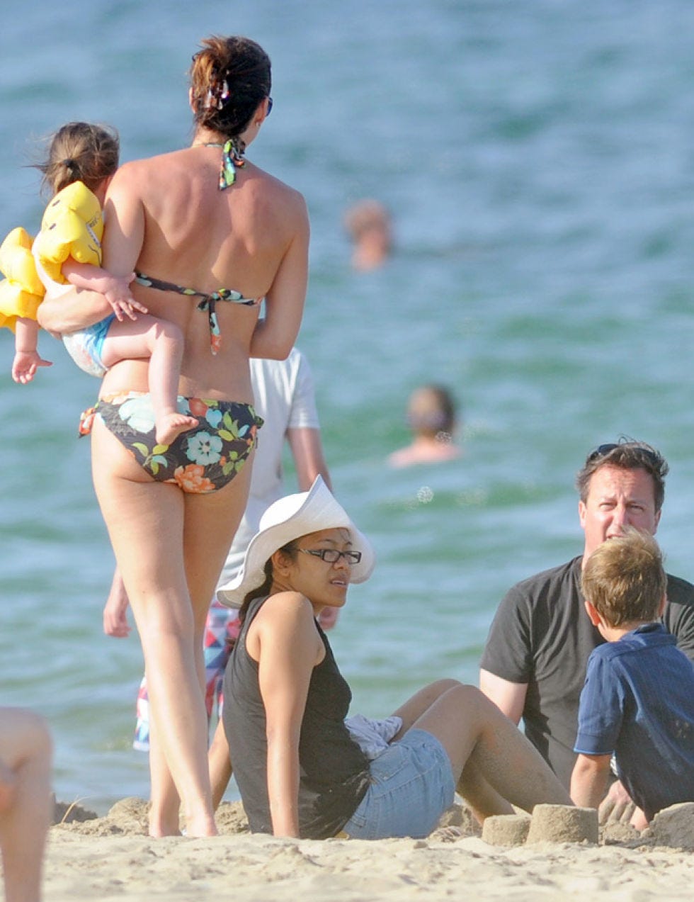 Arm, Leg, Fun, Human body, Brassiere, People on beach, Mammal, Swimwear, Summer, People in nature, 