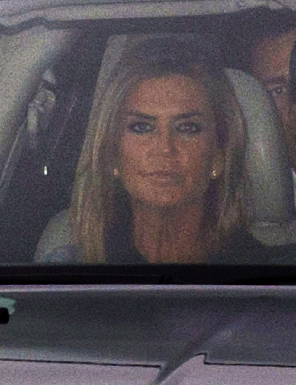 Eyebrow, Glass, Vehicle door, Long hair, Windshield, Automotive window part, Bridal veil, Car seat, 
