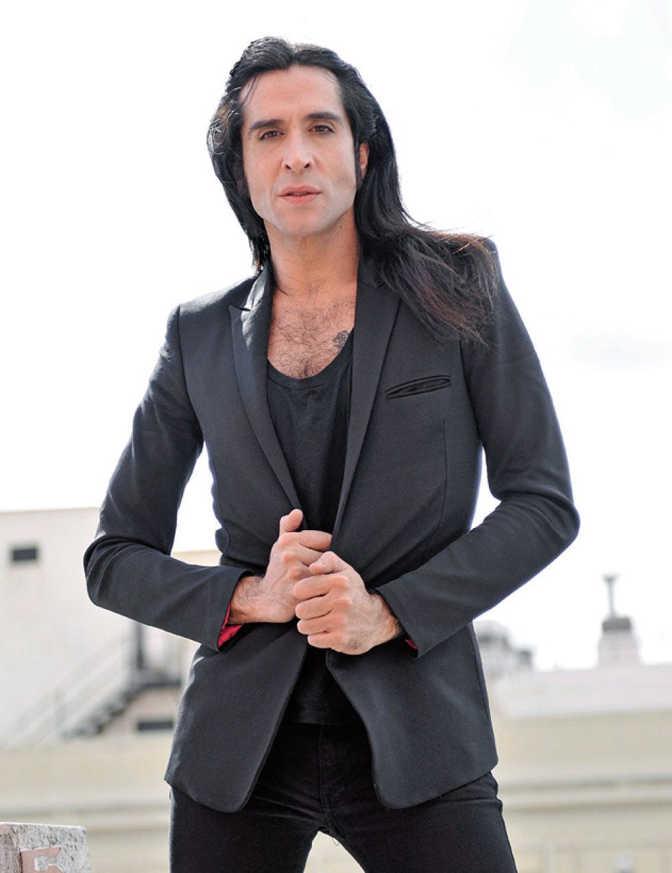 Clothing, Sleeve, Collar, Joint, Outerwear, Standing, Coat, Elbow, Blazer, Black hair, 