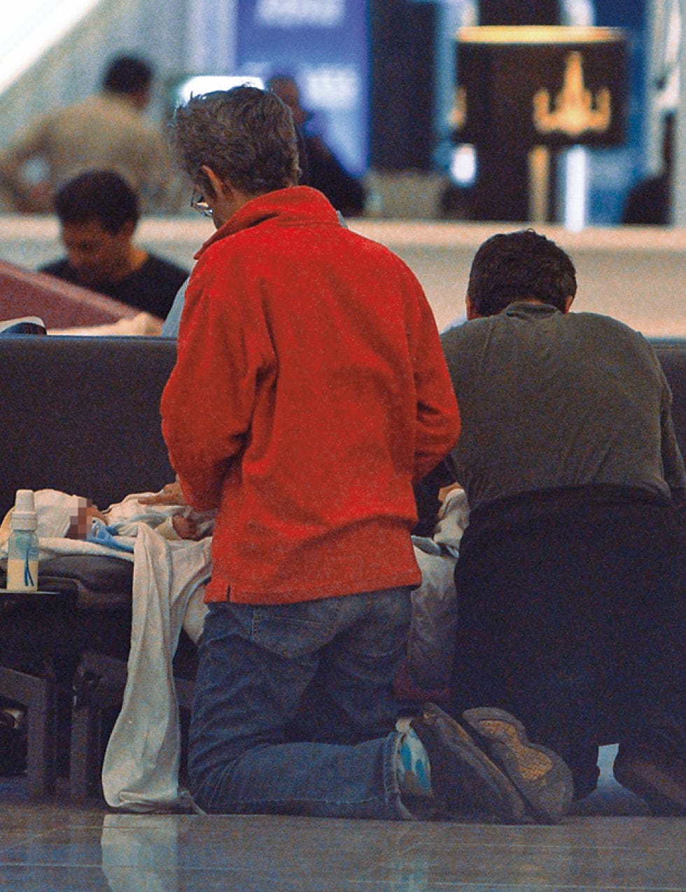 Human body, Jeans, Denim, Back, Luggage and bags, Jacket, Conversation, Hip, Outdoor shoe, Baggage, 