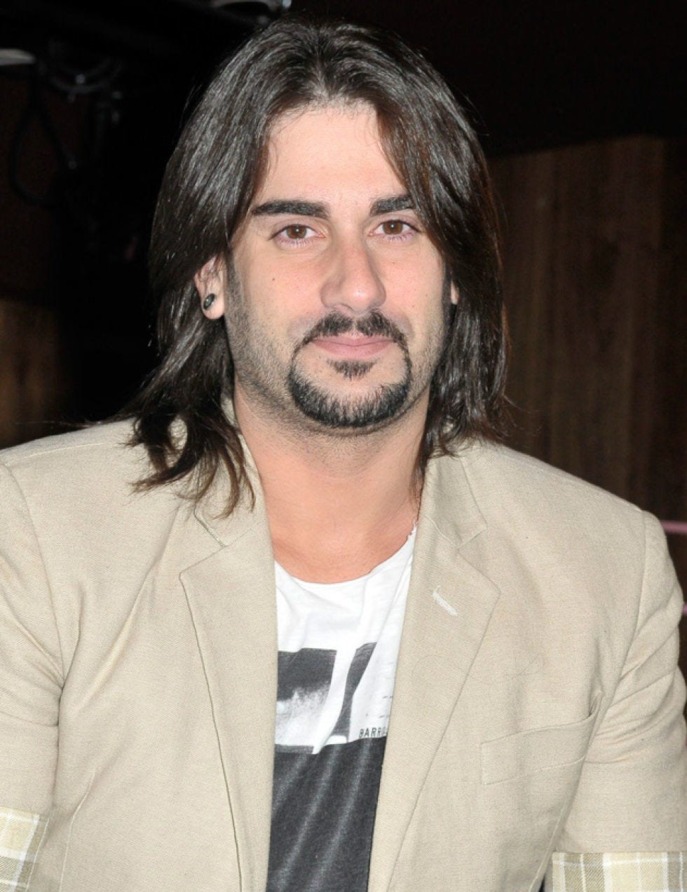 Facial hair, Lip, Cheek, Hairstyle, Chin, Forehead, Eyebrow, Coat, Collar, Beard, 