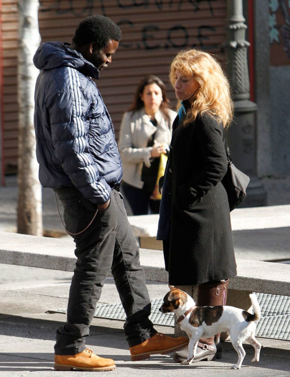 Clothing, Human, Leg, Trousers, Coat, Dog, Carnivore, Dog breed, Vertebrate, Outerwear, 