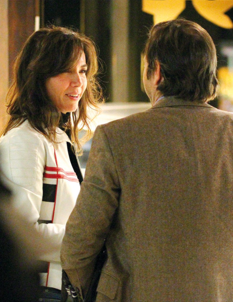 Coat, Outerwear, Interaction, Suit, Blazer, Conversation, Back, Brown hair, Layered hair, Belt, 