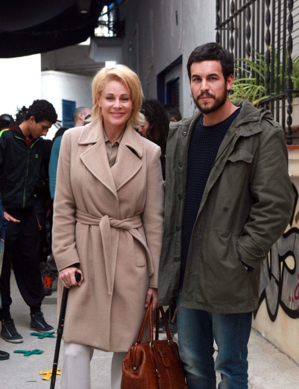 Clothing, Coat, Trousers, Jacket, Bag, Outerwear, Standing, Style, Luggage and bags, Winter, 