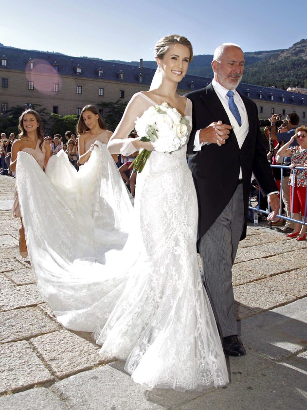 Clothing, Bridal clothing, Dress, Event, Trousers, Human body, Coat, Textile, Photograph, Gown, 