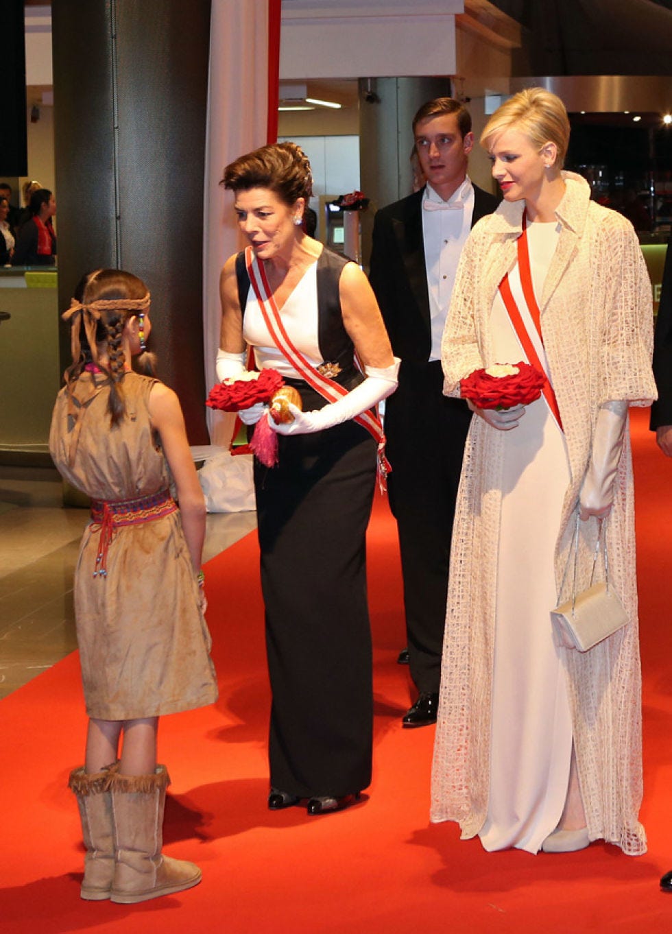 Trousers, Flooring, Carpet, Fashion, Red carpet, Fashion design, Suit trousers, One-piece garment, Picture frame, Premiere, 
