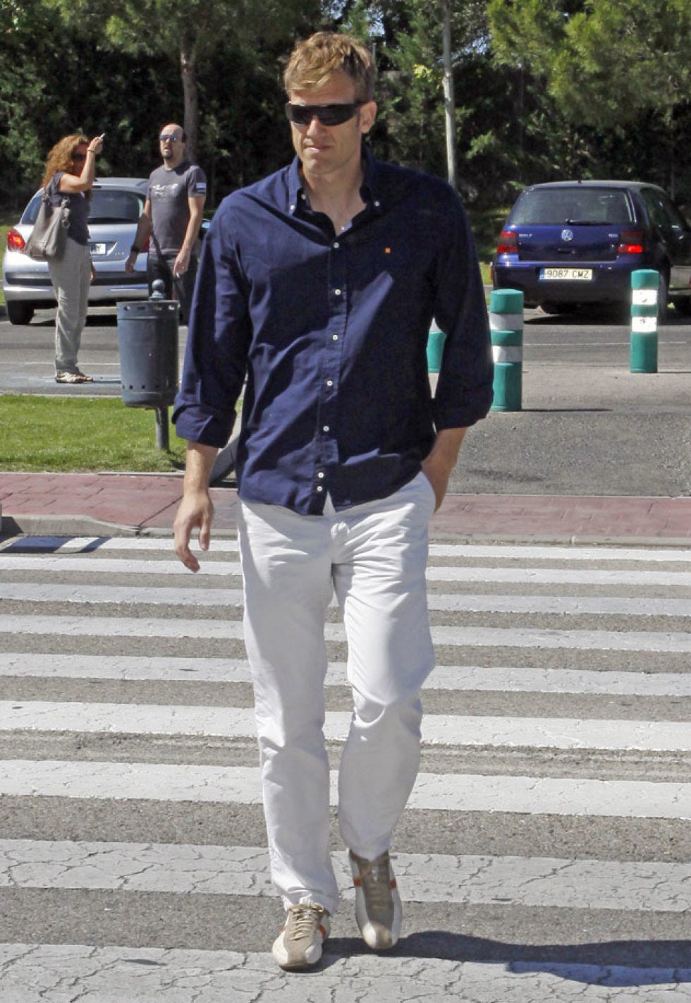 Eyewear, Leg, Land vehicle, Trousers, Shirt, Textile, Outerwear, Sunglasses, Collar, Style, 