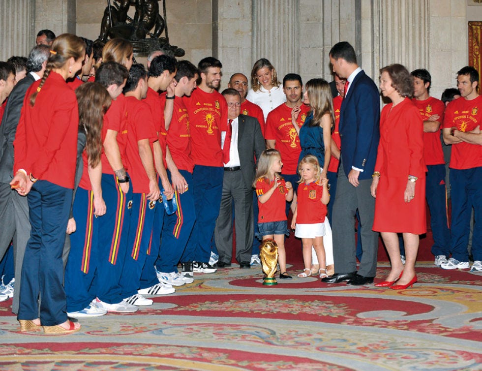 Footwear, Social group, Red, Carmine, Team, Maroon, Carpet, Tradition, Hall, 