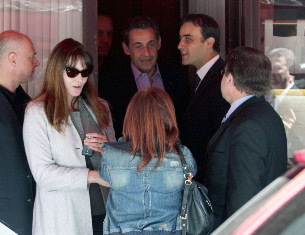 Clothing, Hair, Face, Coat, Outerwear, Jacket, Tie, Blazer, Curtain, Conversation, 