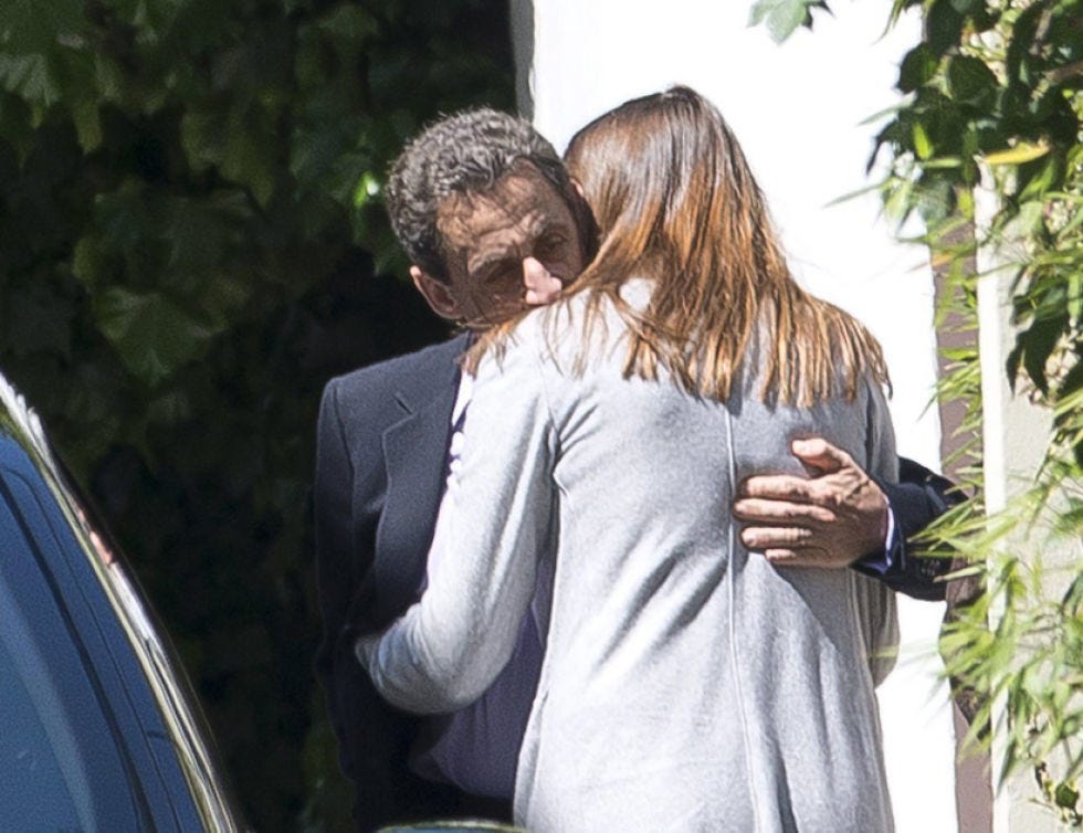 Outerwear, Interaction, Romance, Love, Gesture, Conversation, Back, Automotive window part, Hug, Honeymoon, 