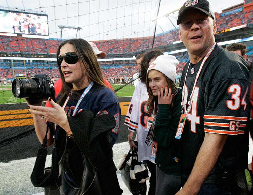 Single-lens reflex camera, Cap, Sport venue, Photographer, Lens, Digital camera, Camera, Digital SLR, Film camera, Stadium, 