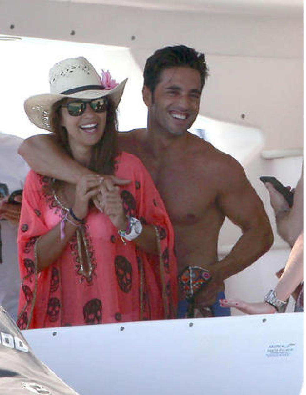 Smile, Finger, Hat, Sunglasses, Happy, Facial hair, Barechested, Chest, Costume accessory, Sun hat, 