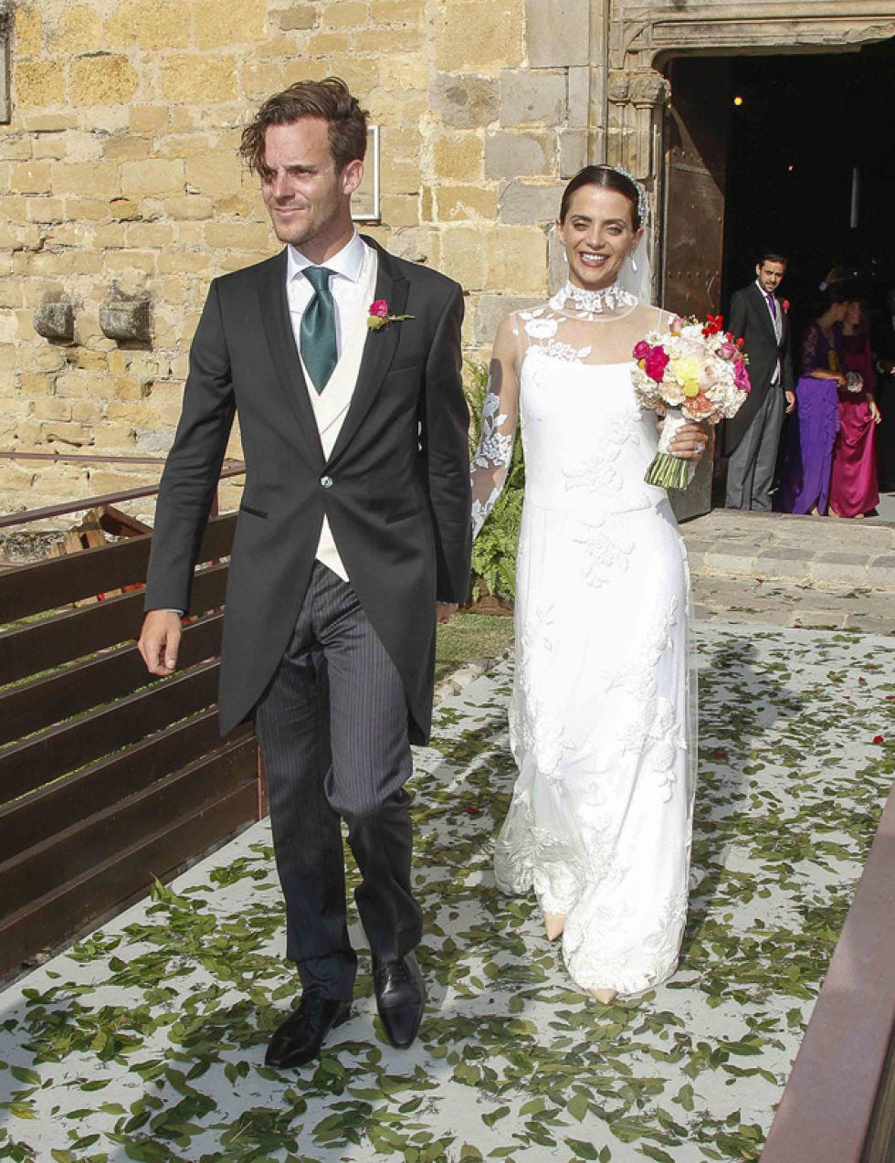 Clothing, Coat, Trousers, Dress, Shirt, Bridal clothing, Petal, Photograph, Outerwear, Standing, 
