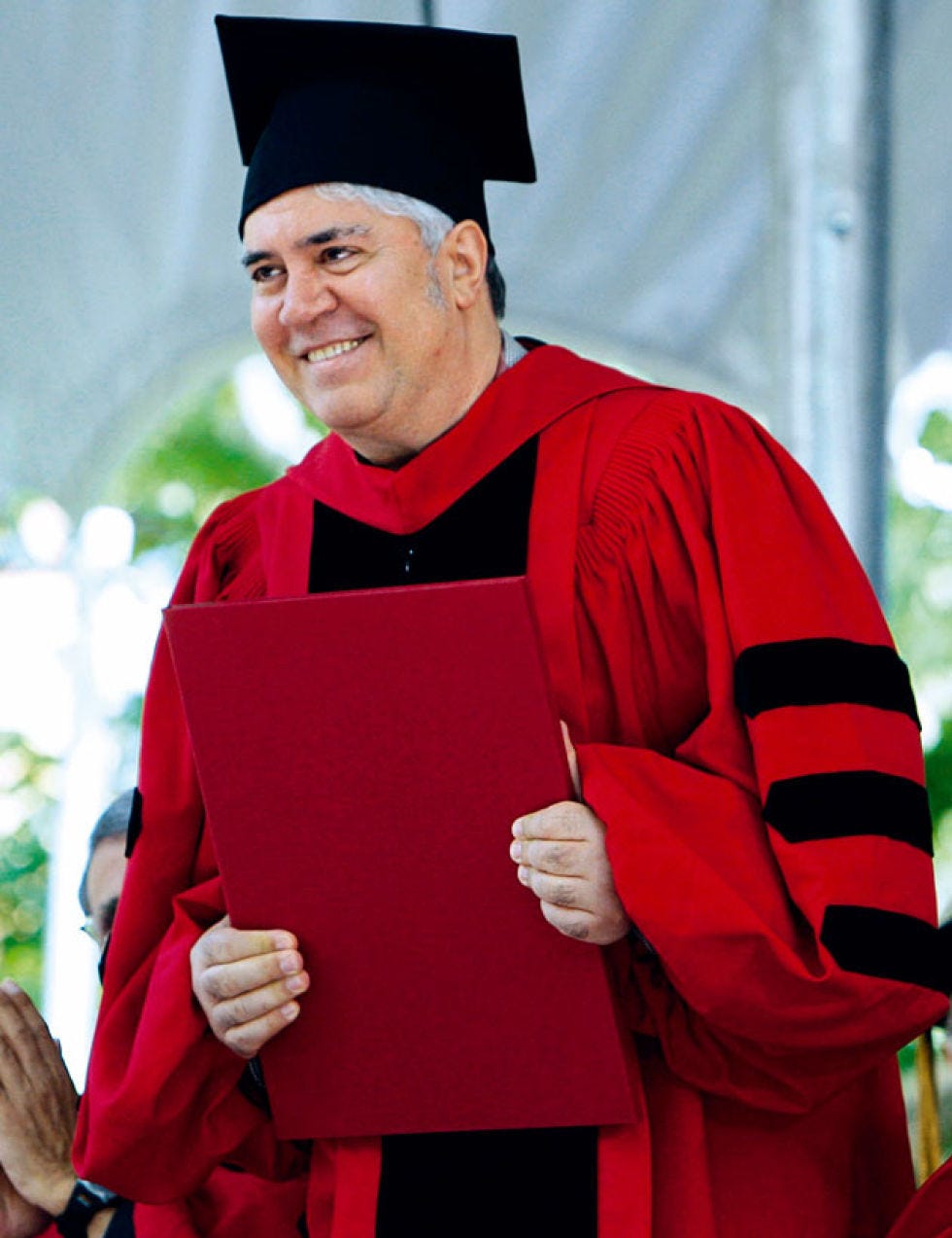 Academic dress, Sleeve, Scholar, Hand, Mortarboard, Collar, Graduation, Headgear, Costume accessory, Phd, 