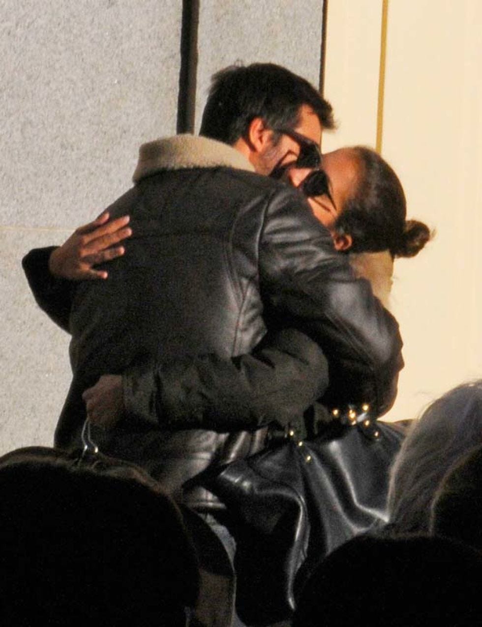 Glasses, Interaction, Black hair, Fur clothing, Fur, Conversation, Hug, Love, Romance, Gesture, 