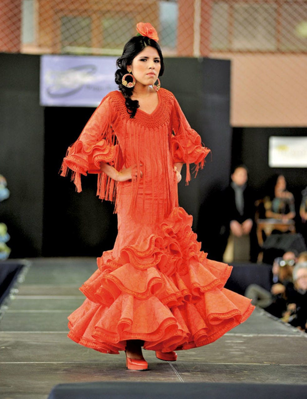 Dress, Formal wear, Fashion model, Fashion, Fashion show, Costume design, Gown, Orange, One-piece garment, Model, 