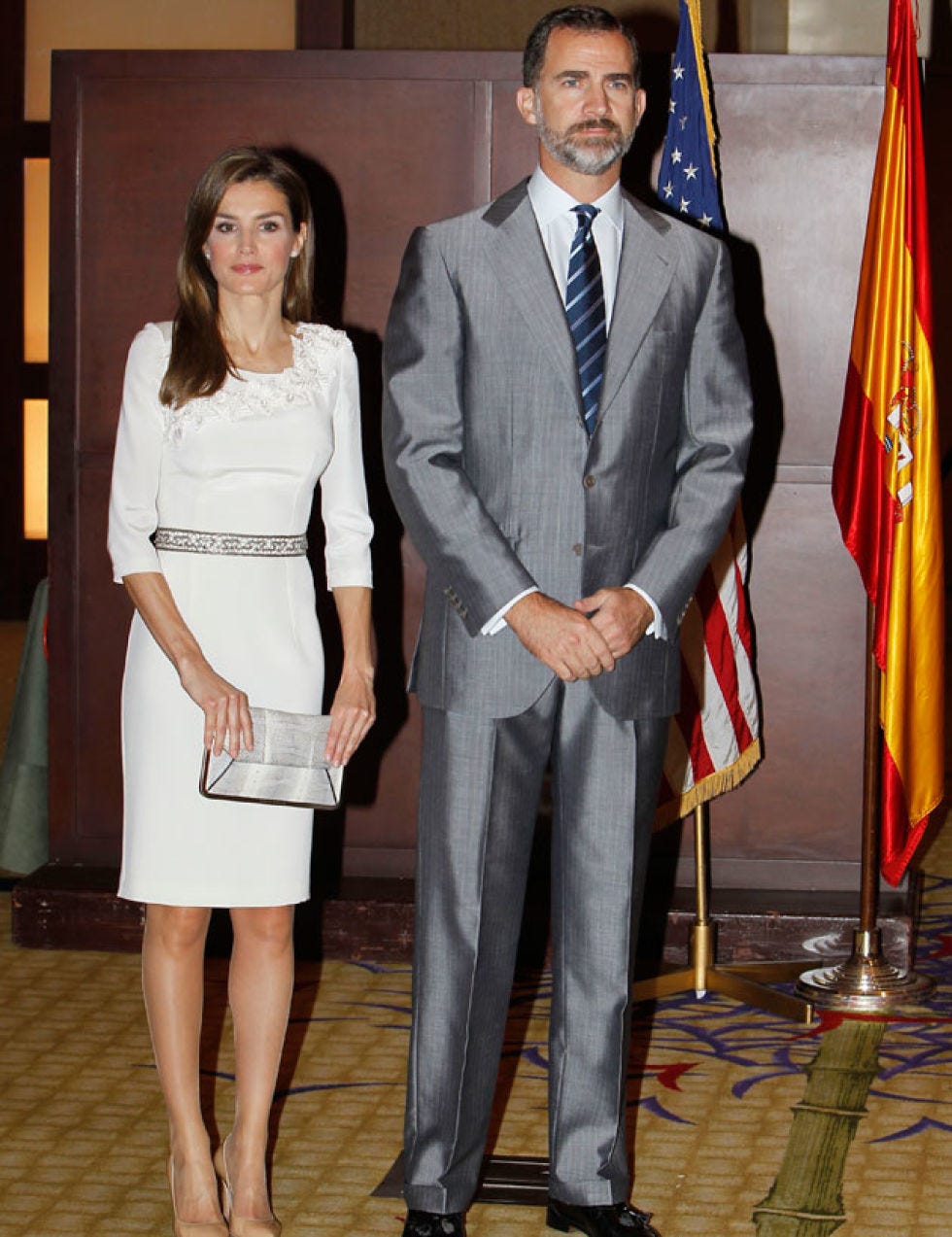 Clothing, Leg, Flag, Dress shirt, Trousers, Collar, Coat, Suit trousers, Shirt, Standing, 