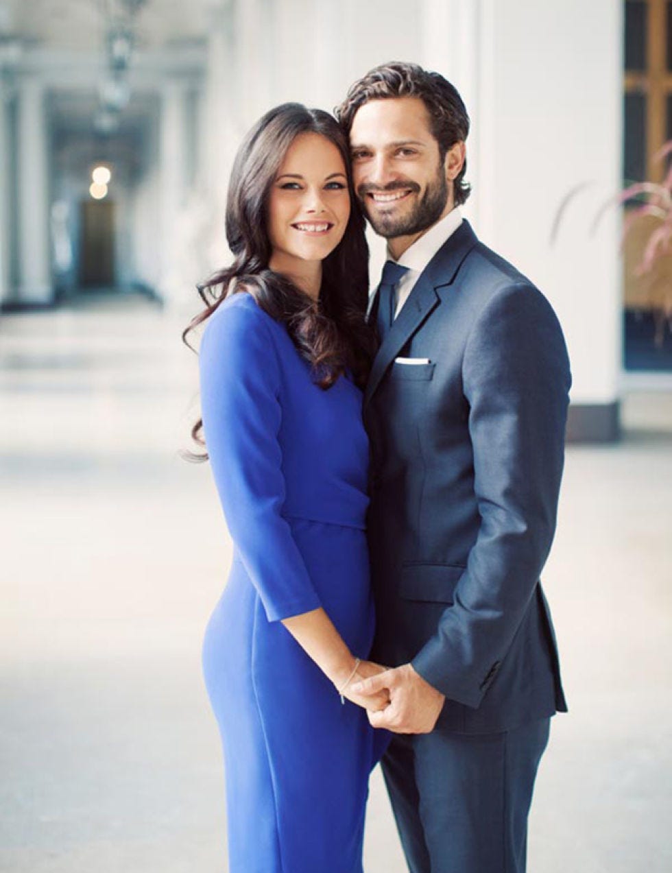 Blue, Smile, Sleeve, Coat, Collar, Standing, Outerwear, Happy, Dress, Formal wear, 