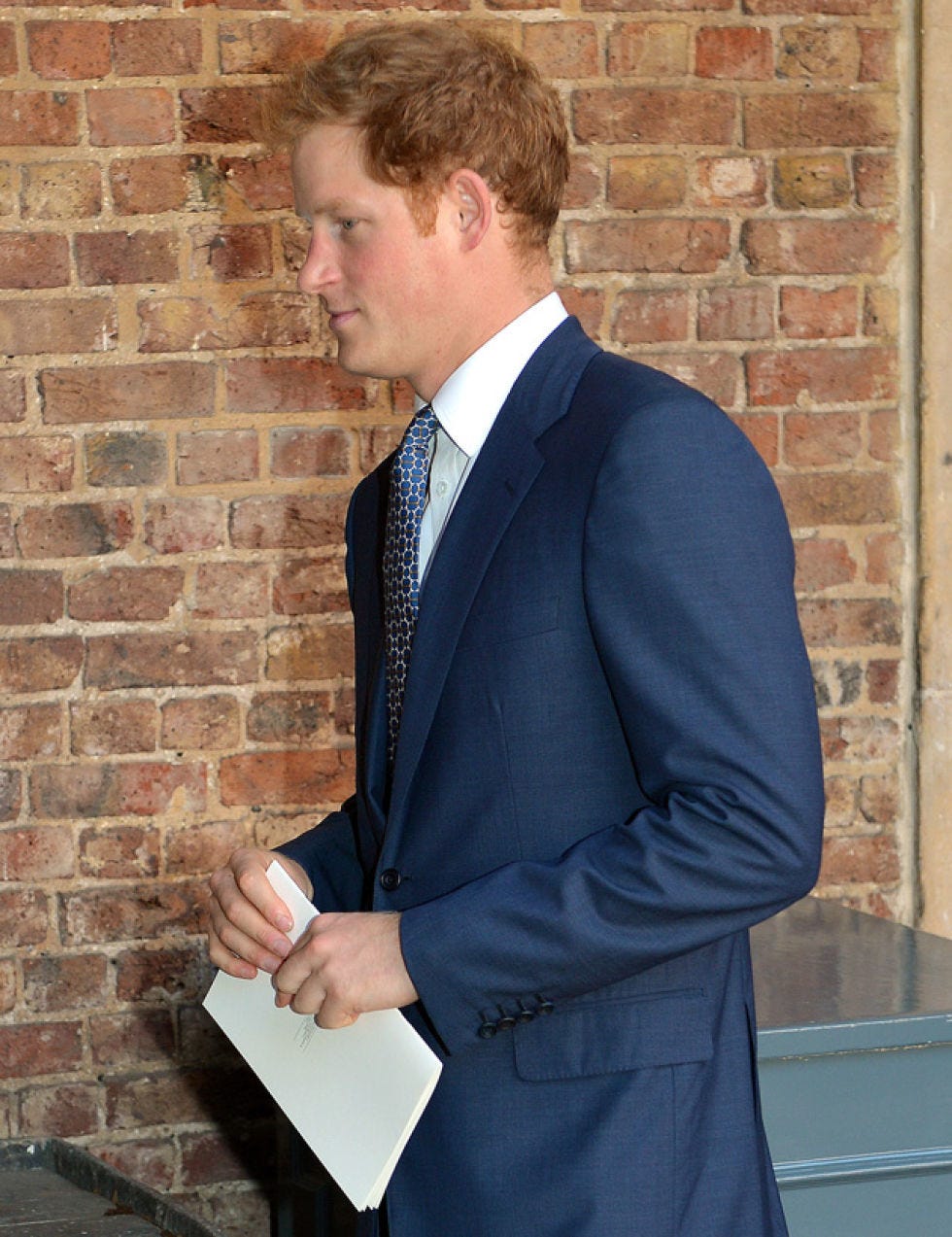 Clothing, Coat, Brick, Dress shirt, Collar, Sleeve, Shoulder, Shirt, Standing, Suit, 