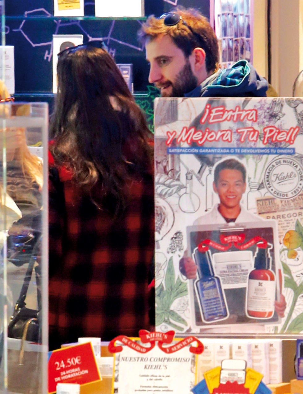 Head, Tartan, Plaid, Facial hair, Retail, Beard, Paper, Advertising, Long hair, Brown hair, 