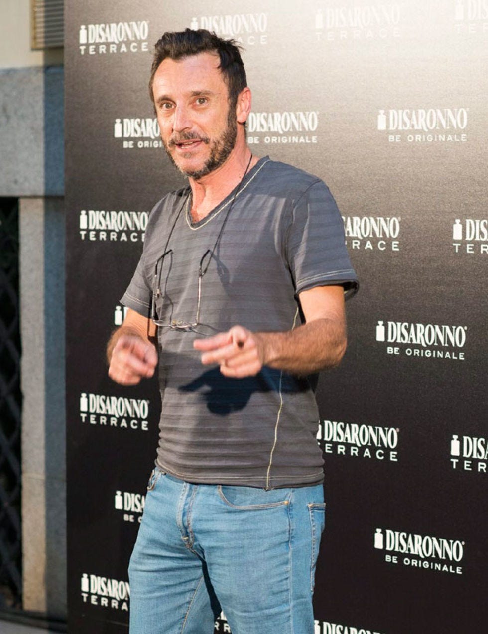 Product, Sleeve, Denim, Jeans, Standing, Logo, Pocket, Muscle, Facial hair, Beard, 