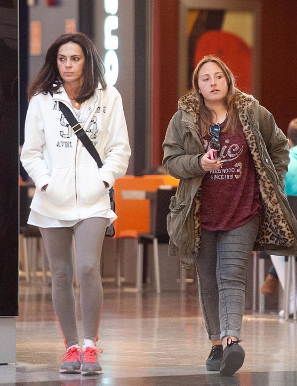 Face, Footwear, Leg, Trousers, Human body, Outerwear, Coat, Jacket, Style, Fashion accessory, 